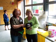 Val with the winner of the Bag of Paydirt donated by Dirt Hogg